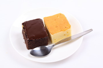 Brown cake and Chocolate cake on white background