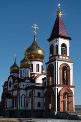 Lonely church on a background of blue sky.