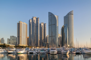 Fototapeta na wymiar Skyscraper and yacht dock in Haeundae, Busan, Korea 