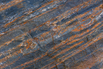 Texture of the stone with layers of iron ore