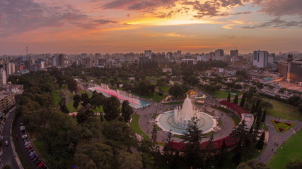 Aerial view to Park of the Reserve with magic water circuit biggest fountain complex day to night timelapse © HyperlapsePro