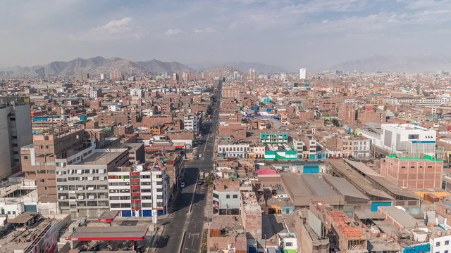 Panoramic skyline of Lima city from above with many buildings aerial timelapse. Lima, Peru