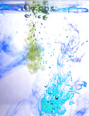 Fototapeta na wymiar Colored ink cloud grows in water. Astract shape background.