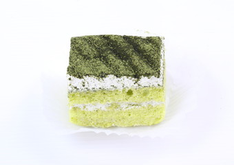 Green tea cake on white background
