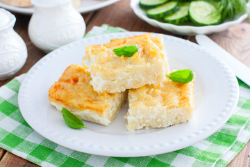 Pasta casserole with egg, sliced into pieces, selective focus