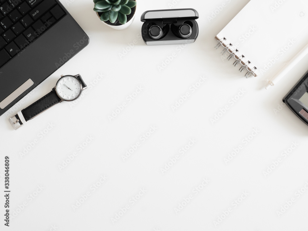 Poster top view of work from home concept with keyboard, calculator and notebook on white background, graph