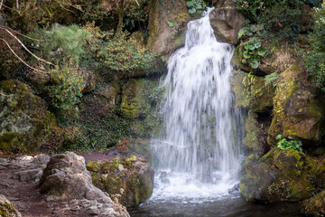 Fototapeta na wymiar A small waterfall from a trip to Jeju Island, South Korea.