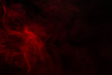 Fototapeta premium Red steam on a black background.