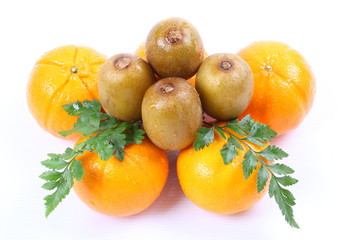 Orange fruit and Kikw isolated on white background
