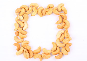 Roasted cashew nuts on white background