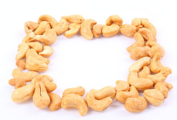 Roasted cashew nuts on white background