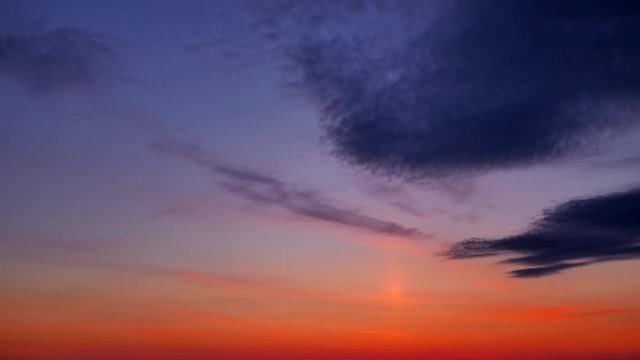 Aerial panoramic time lapse of epic twilight sky with cirrus clouds  in pink, red and blue colors. Sunset horizon from the top of the hill in 4k