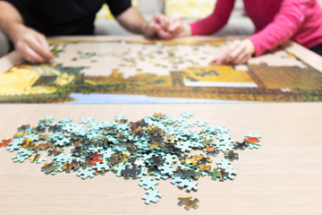 Coronavirus woman hand holding puzzle chip, family concept makin