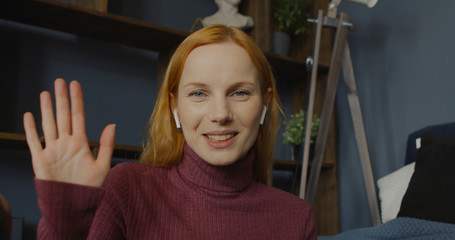 POV Webcam view, Caucasian female working from home, having a work video conference call with...