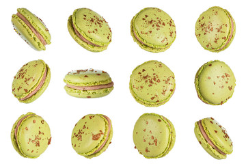 Macro photo of french green macaroon isolated on white background, clipping path.