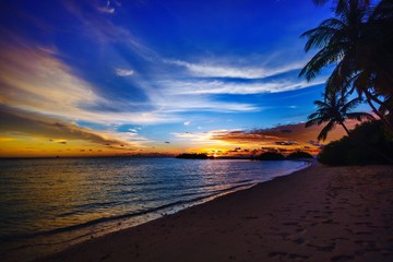 Fototapeta na wymiar Scenic View Of Sea Against Sky At Sunset
