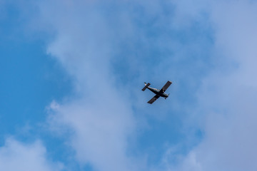 Small Private Prop Plane Flying in the Sky
