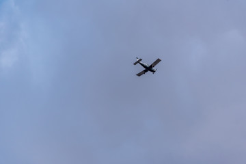 Small Private Prop Plane Flying in the Sky