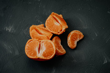 peeled tangerines on the plate