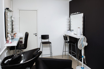 Fototapeta na wymiar Beauty Salon Interior. Black and white gamma.