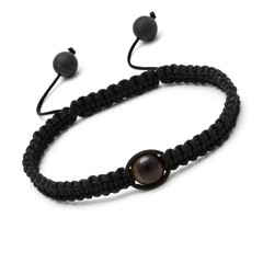 Bracelet noir a perles sur fond blanc