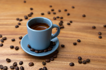 cup of coffee with beans