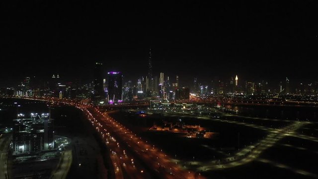Aerial Drone shot of Dubai at night 4K
