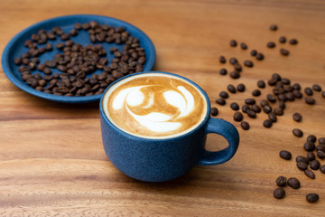 cup of coffee with beans