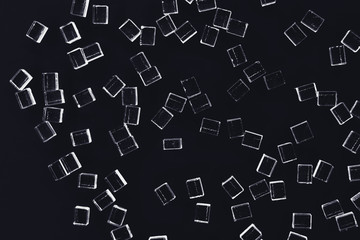 abstract plastic shapes on a black background