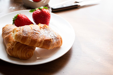 croissant and strawberry