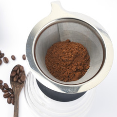 Coffee Beans And Ground Coffee on white background