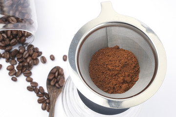 Coffee Beans And Ground Coffee on white background