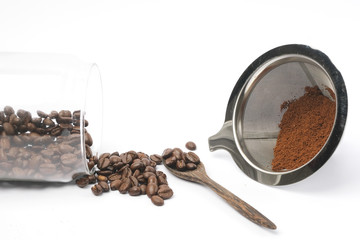 Coffee Beans And Ground Coffee on white background
