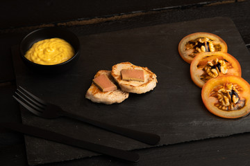 Pork tenderloin dish with pate and tomato and walnut salad