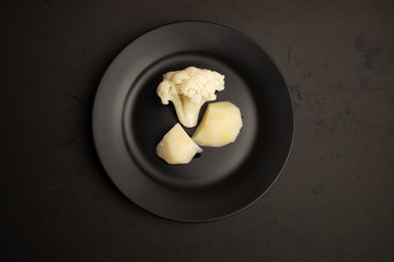cooked cauliflower dish with potatoes