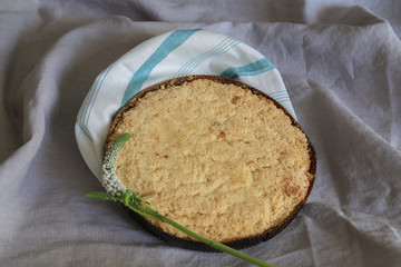 cake with crumbs on a tablecloth