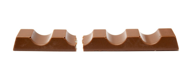 Broken chocolate bar isolated on a white background.