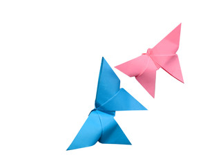two pink and blue paper butterflies