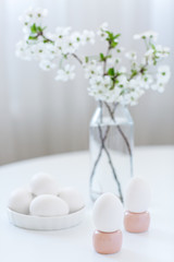 Easter table decoration. Flowers and eggs