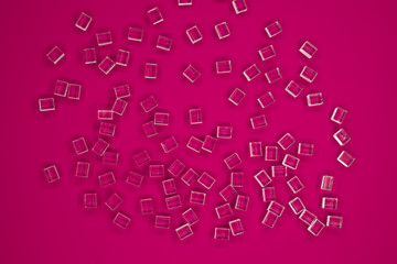 abstract plastic shapes on a purple background