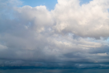 Fototapeta na wymiar Cumulus clouds in the blue sky