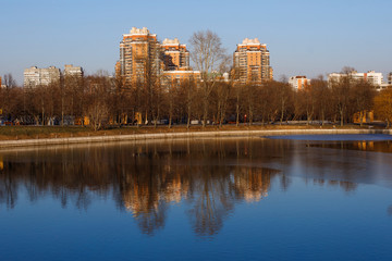 Fototapeta na wymiar Autumn landscape with lake in the Friendship park in Moscow. Russia