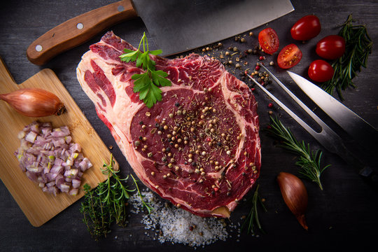 Raw T Bone steak entrecote prepared to Grill on turntable