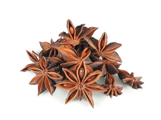 Heap of dried star anise with seeds inside closeup isolated on white background. Spice for cooking and medicinal herb.