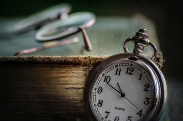 Fototapeta premium Old Clock , old book and Old glasses