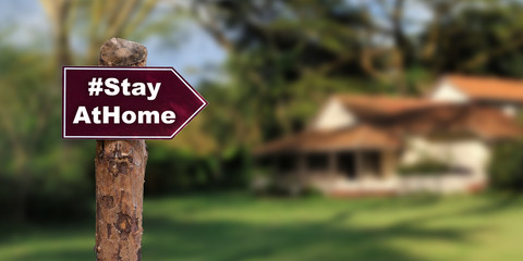 Fototapeta premium Sign with arrow Stay at home