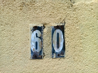 number sixty on a wall