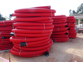HDPE corrugated pipe with double-wall strength at the construction site. Used to protect...