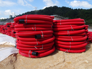 HDPE corrugated pipe with double-wall strength at the construction site. Used to protect...