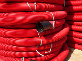 HDPE corrugated pipe with double-wall strength at the construction site. Used to protect...